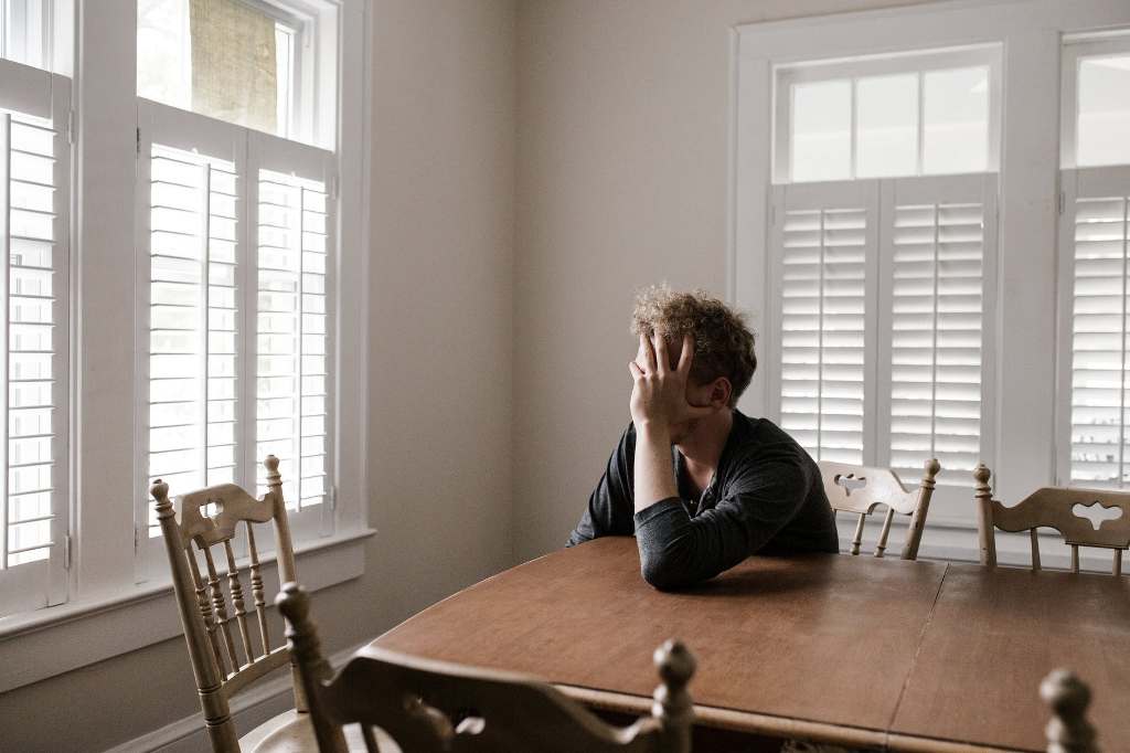 Stress out man in kitchen